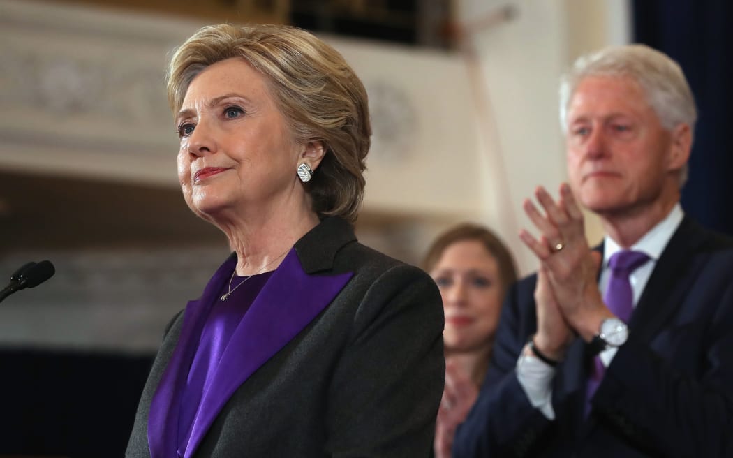 Hillary Clinton accompanied by her husband, former President Bill Clinton, concedes the election.