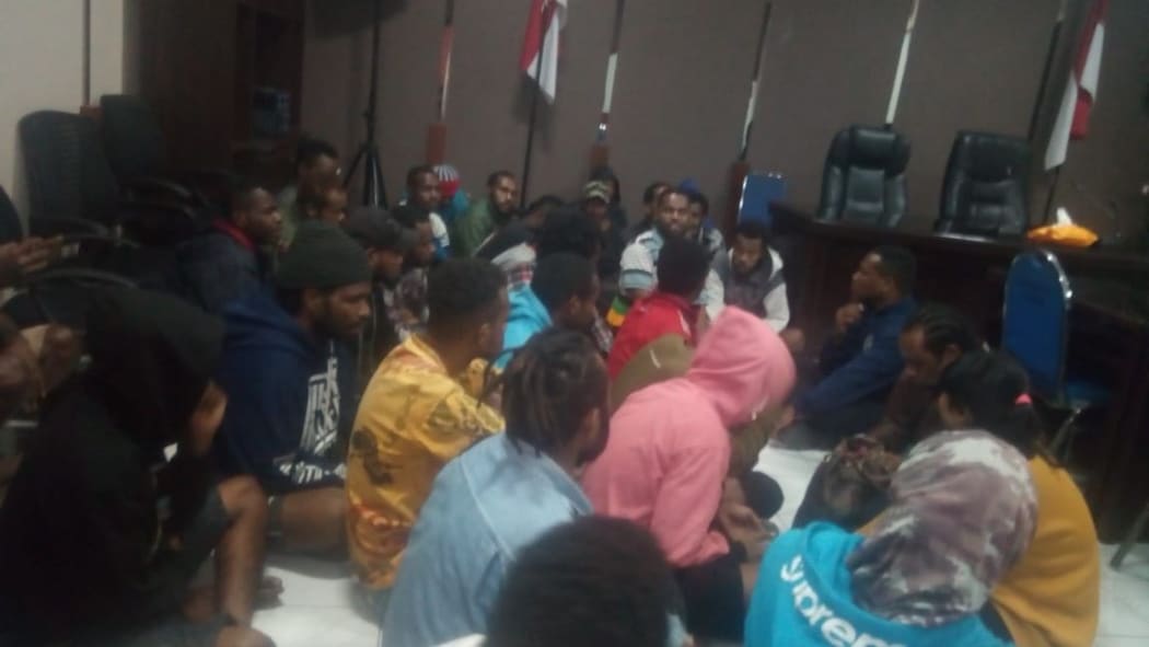 The protesters were arrested and held in the Surabaya police station.