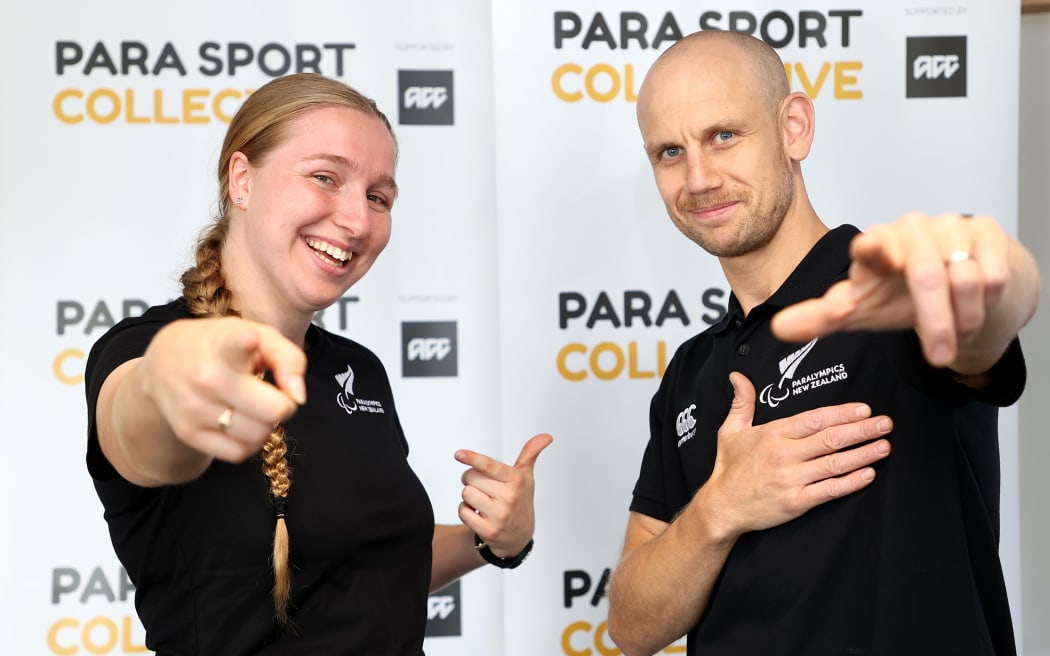 Para Athlete Siobhan Terry (L) and Jack Cooper, Paralympics New Zealand, Para Cycling Development Coach (R) pose during the official launch of the Para Sport Collective at the AUT Millennium Institute.