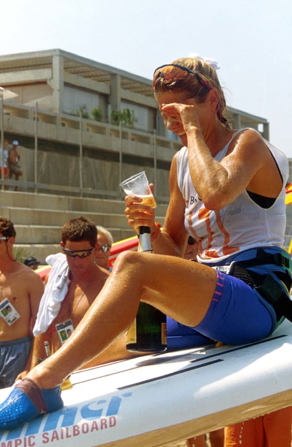Barbara Kendall celebrates after her win at the Barcelona Olympics 1992.
