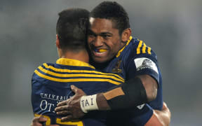 Waisake Naholo and Jason Emery of the Highlanders celebrate after defeating the Chiefs.