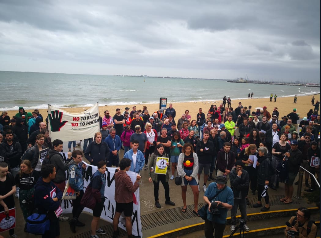 Counter protesters on St Kilda Beach.
