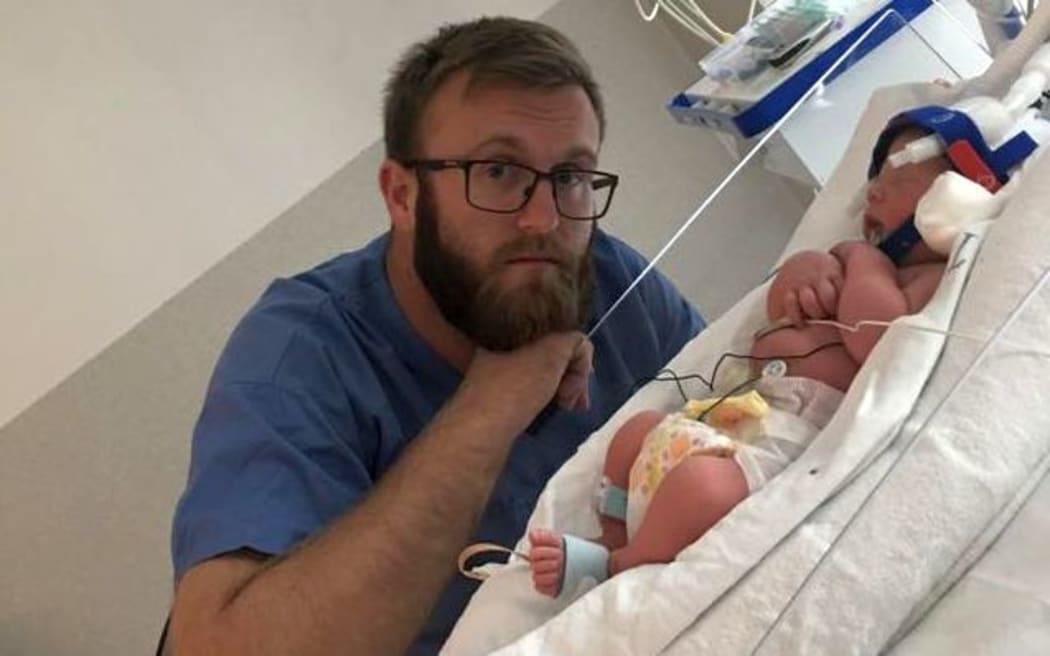 Alex Dexter and his son at Middlemore Hospital.