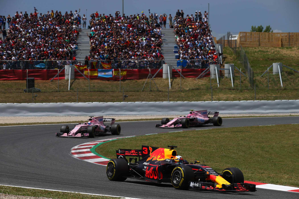 Force India's Sergio Perez and Esteban Ocon chasing  Red Bull's Daniel Ricciardo in the Belgian Grand Prix