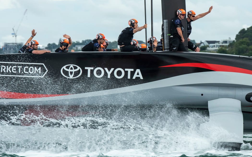 Team New Zealand tow back to base after winning race nine. America's Cup 2021.