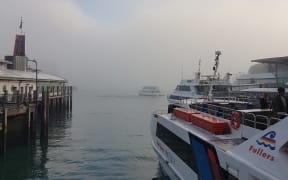 Fog in the harbour as seen from the Downtown Ferry Terminal.