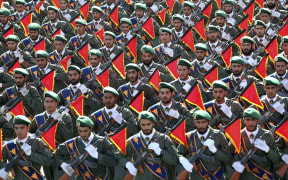 Iran's Revolutionary Guard troops march in a military parade marking the 36th anniversary of Iraq's 1980 invasion of Iran in 2016.