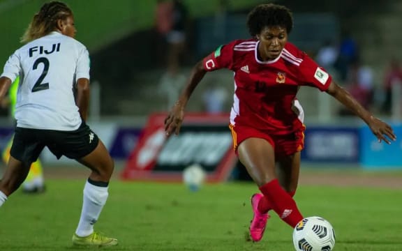 Meagen Gunemba in possession for Papua New Guinea in the OFC Women's Nations Cup match against Fiji.