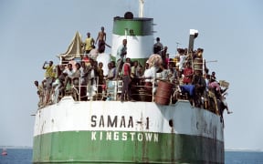 Refugees have risked their lives by fleeing into the ocean for decades, including in 1992 when hundreds of Somalians crammed aboard this boat.