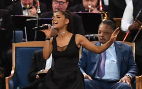 Ariana Grande performs during Aretha Franklin's funeral at Greater Grace Temple.