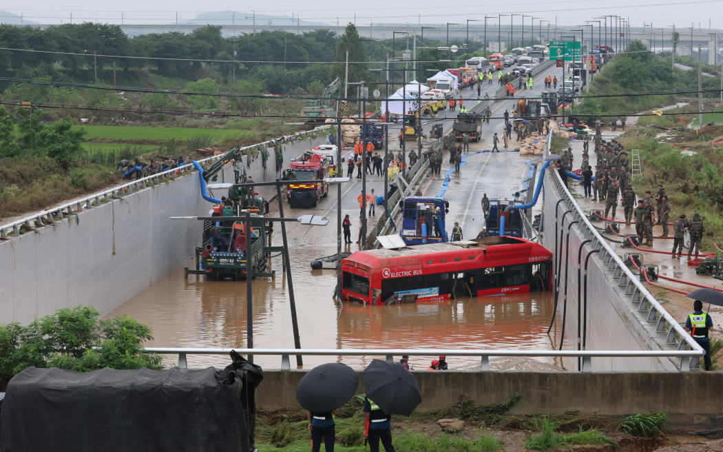 South Korea floods Dozens die in flooded tunnel and landslides RNZ News