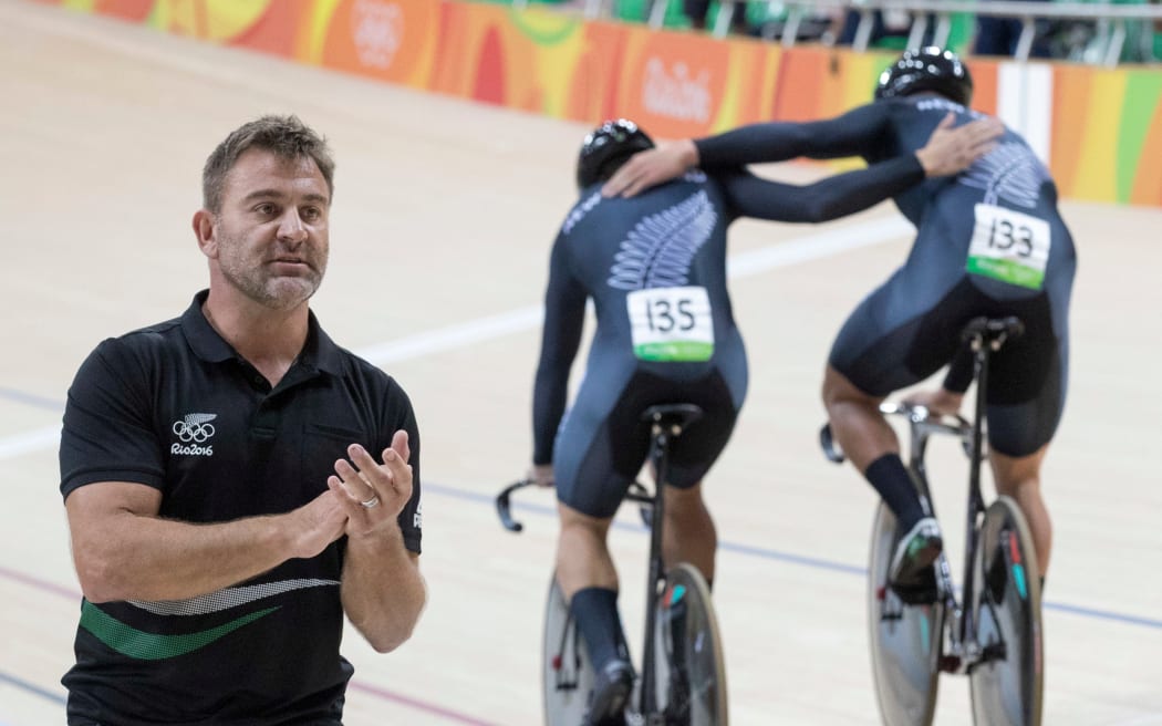 Anthony Peden applauds the silver medal efforts of the New Zealand men's sprint team at the Rio Olympics.