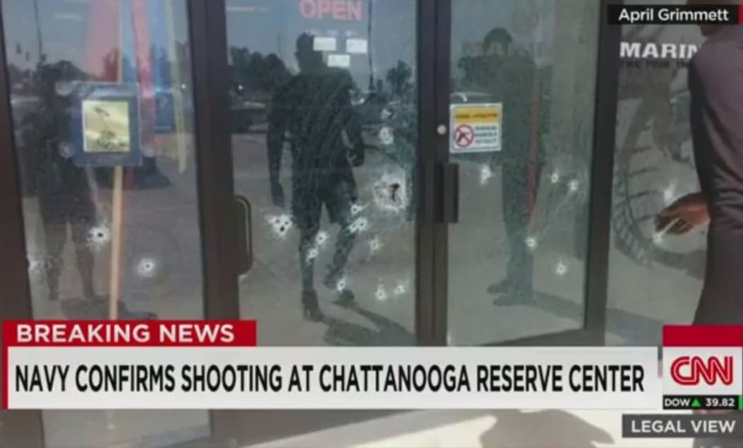 This image is reported to show bullet holes in a navy recruitment centre in Tennessee.