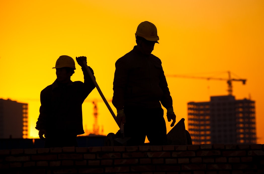 silhouette of construction worker