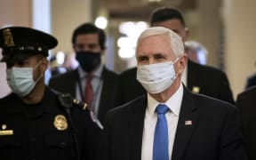WASHINGTON, DC - MAY 19: Vice President Mike Pence wears a mask as he departs the office of Senate Majority Leader Mitch McConnell after meeting with him at the U.S. Capitol on May 19, 2020 in Washington, DC.