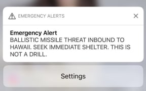 Hawaiians receive a text warning of a ballistic missile threat but officials later say it was a mistake.