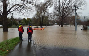 Flooding around the Heathcote River in Christchurch has seen the Coastguard called in to help reach stranded residents.