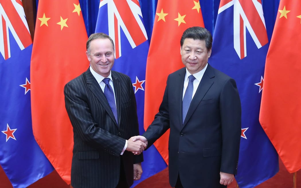 John Key with Chinese President Xi Jinping in Beijing during a visit in March.