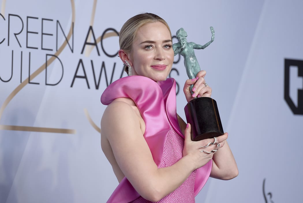 Emily Blunt poses with the award for outstanding performance by a female actor in a supporting role for "A Quiet Place" at the SAG awards