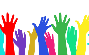 Graphic design of hands raised to vote