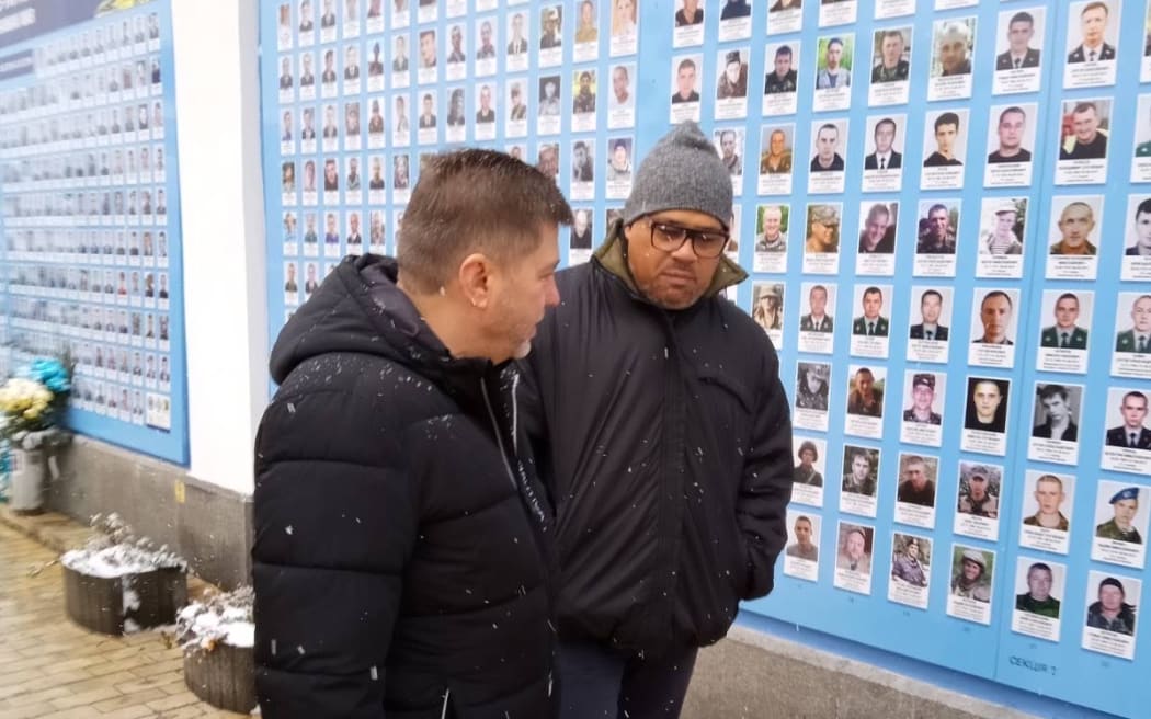 Ukraine Deputy Minister of Defence Oleksandr Polishchuk (left) and Minister of Defence Peeni Henare at the Wall of Remembrance of the Fallen for Ukraine in Kyiv.