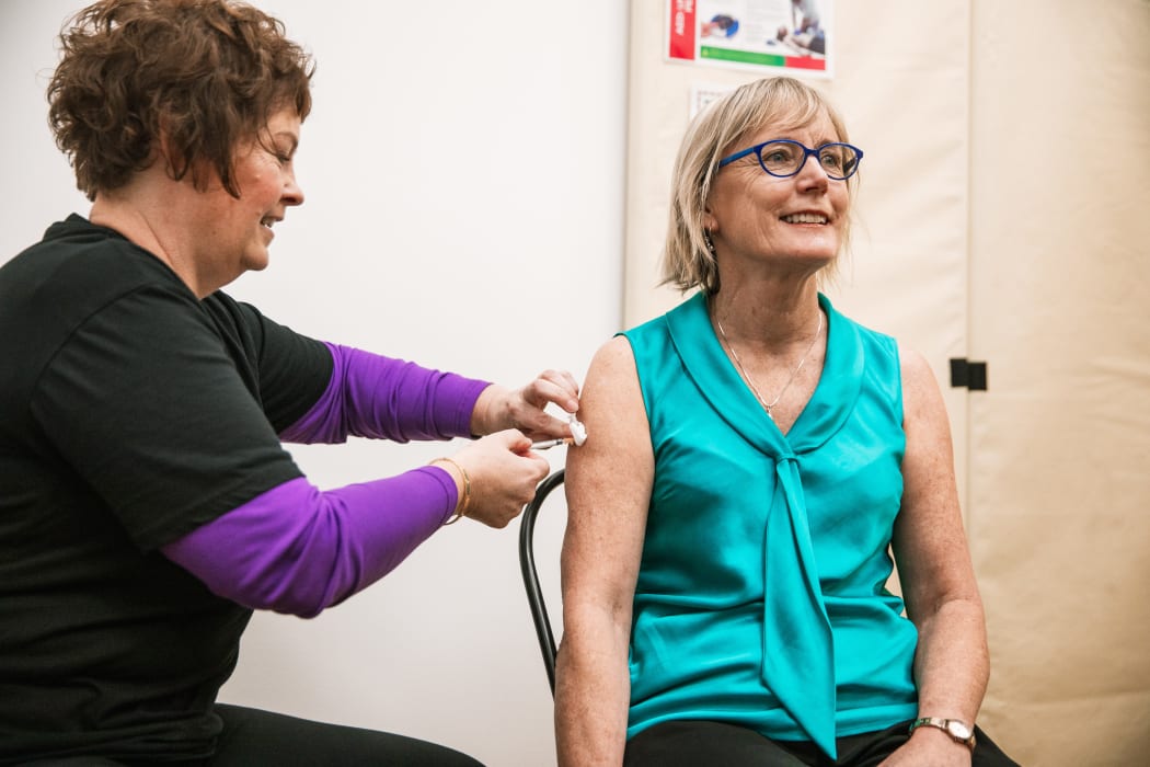 Immunisation Advisory Centre (IMAC) Director, Nikki Turner receiving her COVID-19 vaccination