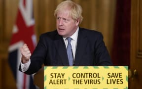 Britain's Prime Minister Boris Johnson attending a remote press conference to update the nation on the novel coronavirus Covid-19 pandemic inside 10 Downing Street in central London on July 31, 2020.