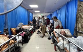 Patients and internally displaced people are pictured at Al-Shifa hospital in Gaza City on 10 November 10, 2023, amid ongoing battles between Israel and the Palestinian Hamas movement.