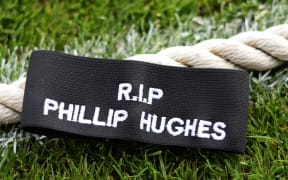 Phillip Hughes tribute black armband.