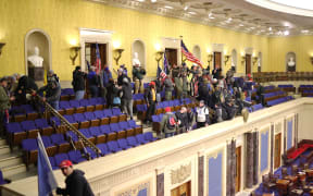 Protesters enter the Senate Chamber on January 06, 2021 in Washington, DC.