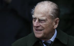 Britain's Prince Philip, Duke of Edinburgh leaves after attending Royal Family's traditional Christmas Day church service at St Mary Magdalene Church in Sandringham, Norfolk, eastern England, on December 25, 2017. (Photo by Adrian DENNIS / AFP)