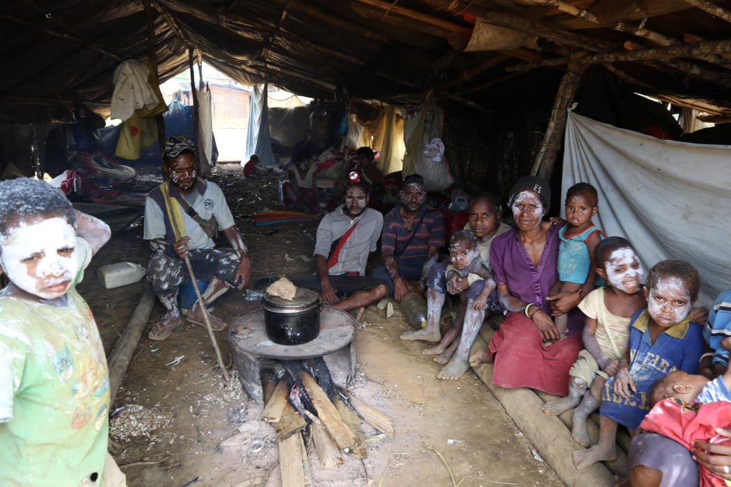A group of people in one of the areas hit by the PNG earthquake