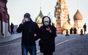 Illustration image of people wearing a medical mask in the city centre of Moscow during the pandemic of COVID-19 in Russia