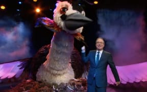 In this screengrab of the Last Week Tonight show, comedian John Oliver appears alongside a giant mechanised grebe as part of his plan to to appeal to hearts and minds in an attempt to stack the Bird of the Century competition.