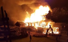 Tapu Te Ranga Marae in flames.