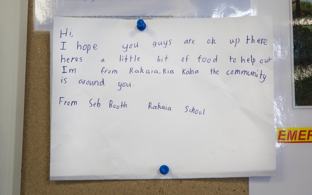A handwritten note that came with some goods donated to Takahanga Marae.