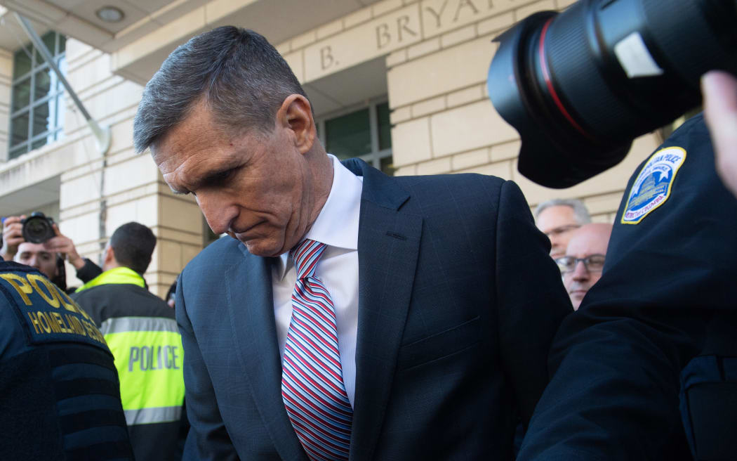Former national security advisor Michael Flynn leaving court after his sentencing was delayed.