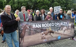 Protesters, who want rodeo to be banned, presented a petition to parliament.