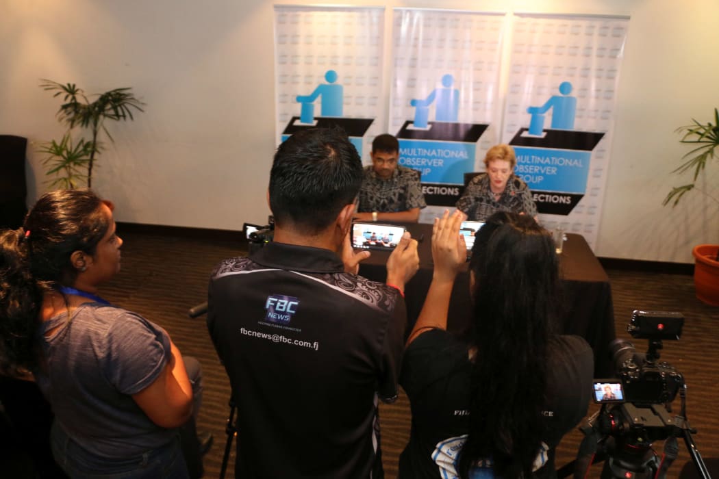 The Mulitnational Observer Group hold a press conference in Suva