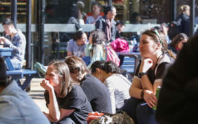 Auckland University students listen to some Auckland mayoral candidates.