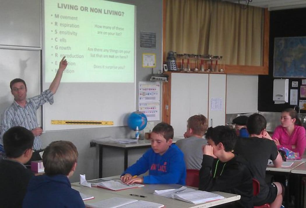 A Year 9 science class at Onslow College with teacher at the front..