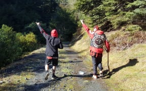Members of the Mongrel Mob search for two of their friends, lost in the Kaimanawa Forest since the weekend.