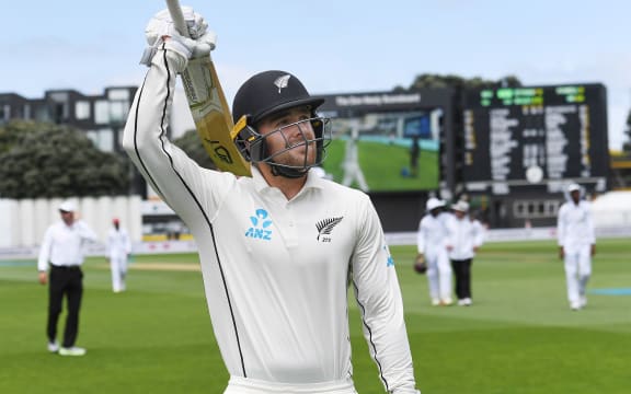 Tom Blundell celebrates a century on test debut.
