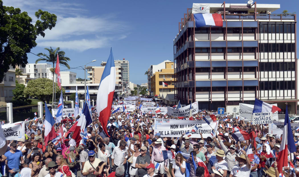 People take part in a demonstration on April 24, 2015 in Noumea, New-Caledonia, called by two right wing UMP affiliated parties to codemn the French Governemnt policy about New-Caledonia forced march towards independance.