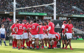 Tonga regroup under their posts after one of the 14 tries they conceded against the All Blacks in Hamilton.