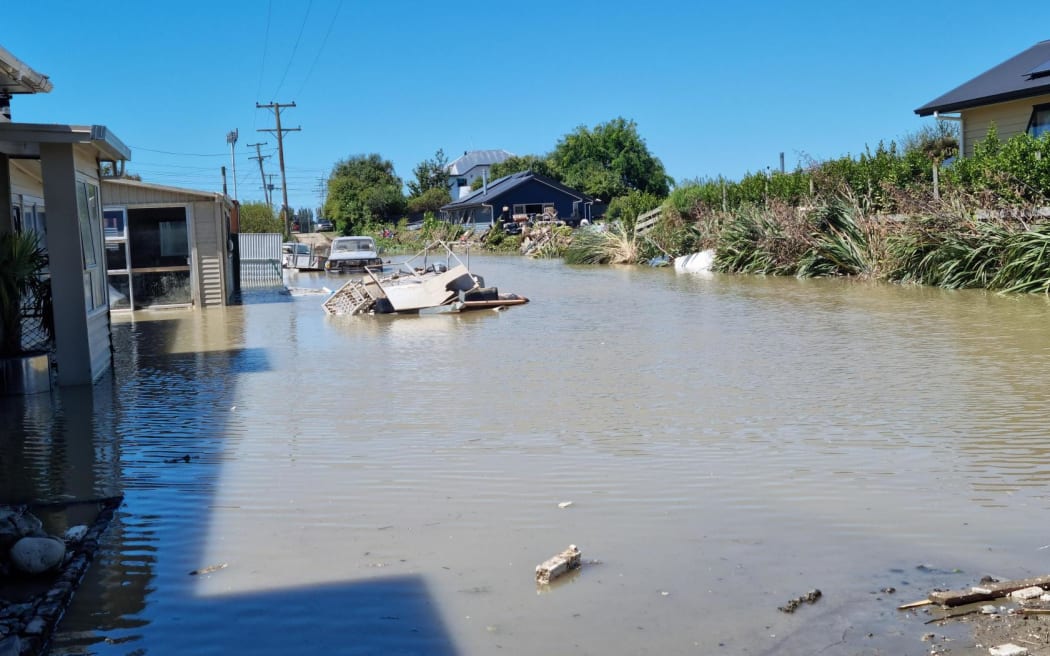 A community-led cleanup underway in Waiohiki on Saturday.