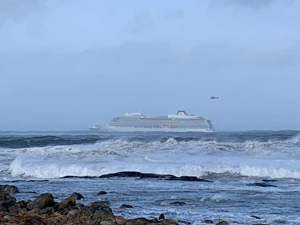 The cruise ship Viking Sky is pictured on March 23, 2019 near the west coast of Norway at Hustadvika near Romsdal.
