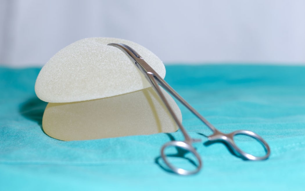 The rate of cancer linked to breast implants is higher than initially thought.