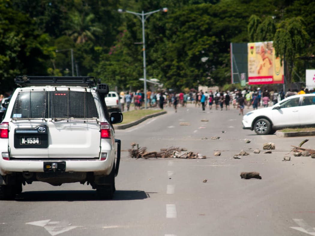 Rocks on the road following the rioting in Honiara.