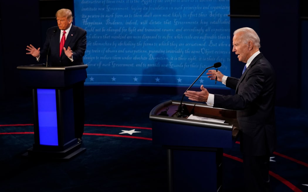 NASHVILLE, TENNESSEE - OCTOBER 22: Democratic presidential candidate former Vice President Joe Biden answers a question as President Donald Trump listens during the second and final presidential debate at Belmont University on October 22, 2020 in Nashville, Tennessee.